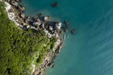 Summer at Tata Beach in Abel Tasman National Park on a stunning day on the water, Tasman, New Zealand.