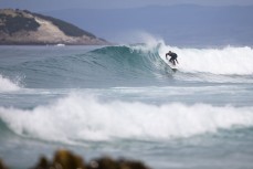 A surfer makes the most of a summer east swell at Blackhead Beach, Dunedin, New Zealand. Photo: Derek Morrison