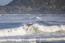 Karne Gabbott enjoying the waves at Tauranga Bay, Westport, West Coast, New Zealand.Credit: www.boxoflight.com/Derek Morrison