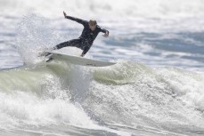 Jake Owen frees his fins during a freesurf at Tauranga Bay, Westport, West Coast, New Zealand.Credit: www.boxoflight.com/Derek Morrison