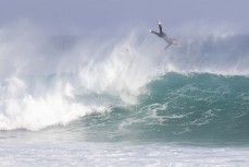 A surfer hits the eject button during a solid swell at St Kilda, Dunedin, New Zealand.Credit: www.boxoflight.com/Derek Morrison