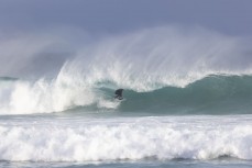 Sam Charlesworth pulls into a barrel during a solid swell at St Kilda, Dunedin, New Zealand.Credit: www.boxoflight.com/Derek Morrison