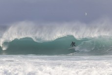 Ollie Charlesworth pulls into a barrel during a solid swell at St Kilda, Dunedin, New Zealand.Credit: www.boxoflight.com/Derek Morrison