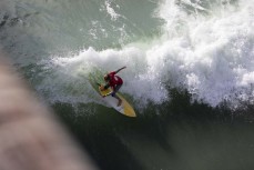 Leia Millar, of Piha, on form beneath the pier during the 2021 Duke Festival of Surfing held at New Brighton, Christchurch, New Zealand. Photo: Derek Morrison