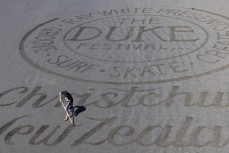 Sand artist Jeremy Lillico puts the finishing touches on a tidal artwork during the 2021 Duke Festival of Surfing held at New Brighton, Christchurch, New Zealand. Photo: Derek Morrison