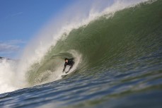 Leon Santorik makes the most of a spring swell hits The Ledge at Manu Bay, Raglan, Waikato, New Zealand.
