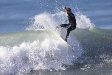 Sonny Lyons hits the end section during a surf break near Kaikoura, New Zealand. Photo: Derek Morrison