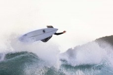 Nixon Reardon takes flight in playful waves during a late autumn swell at St Clair, Dunedin, New Zealand.