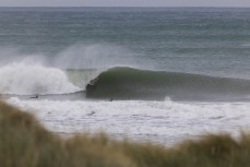 A surfer gets tubed during a fun east swell at Aramoana, Dunedin, New Zealand.Credit: www.boxoflight.com/Derek Morrison