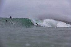 Josh Thickpenny drops in during a fun east swell at Aramoana, Dunedin, New Zealand.