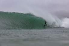 Will van der Beek casual in the barrelo during a fun east swell at Aramoana, Dunedin, New Zealand.