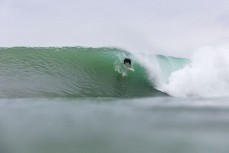 Late under the lip take-off during a fun east swell at Aramoana, Dunedin, New Zealand.