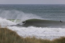 A surfer hunts for a barrel during a fun east swell at Aramoana, Dunedin, New Zealand.Credit: www.boxoflight.com/Derek Morrison