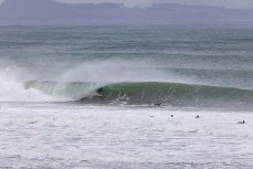Ollie Charlesworth gets tubed during a fun east swell at Aramoana, Dunedin, New Zealand.Credit: www.boxoflight.com/Derek Morrison