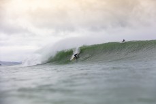 A surfer lines up during a fun east swell at Aramoana, Dunedin, New Zealand.