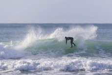Tash Civil slashes a wave during a fun east swell at Aramoana, Dunedin, New Zealand.Credit: www.boxoflight.com/Derek Morrison