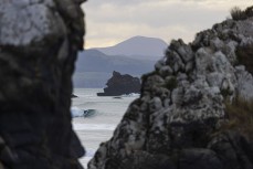 A surfer through the gap during a fun east swell at Aramoana, Dunedin, New Zealand.Credit: www.boxoflight.com/Derek Morrison