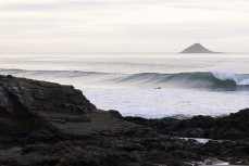 A rare point break lines up during a clean swell near Dunedin, New Zealand.Credit: www.boxoflight.com/Derek Morrison