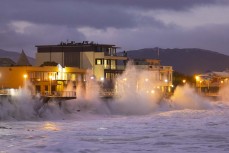 Stormy conditions as waves hammer the sea wall at St Clair, Dunedin, New Zealand.
Credit: www.boxoflight.com/Derek Morrison