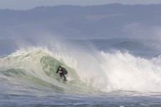 Reiss tucks into a barrel as the storm swell abates at Blackhead, Dunedin, New Zealand.Credit: www.boxoflight.com/Derek Morrison