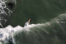 Aerial view during a surf at a break on the north coast, Dunedin, New Zealand. Photo: Derek Morrison