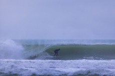 A surfer gets barreled during a winter session on the North Coast, Dunedin, New Zealand.Credit: www.boxoflight.com/Derek Morrison