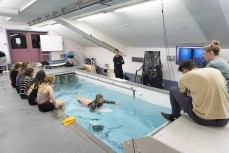 Queen's High School Surf Academy surfer Rewa Morrison reviewing her paddle technique at the University of Otago Physed School aqautic flume, Dunedin, New Zealand.Credit: www.boxoflight.com/Derek Morrison