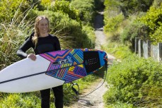 Hayley Pascoe shows the board artwork she did while she was pregnant with her daughter. Blackhead, Dunedin, New Zealand.Credit: www.boxoflight.com/Derek Morrison