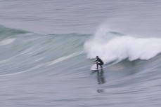 A surfer drops into a wave during a dawn session at St Clair, Dunedin, New Zealand.
Credit: www.boxoflight.com/Derek Morrison