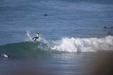 Playful lineup at Blackhead, Dunedin, New Zealand.