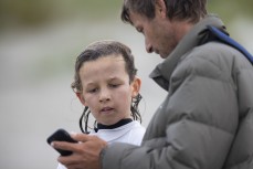 Jack Higgins with dad Craig during the 2021 South Island Primary School Championships held at North Wai, New Brighton, Christchurch, New Zealand. Photo: Derek Morrison