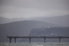 New Brighton Pier cloaked in rain during the 2021 South Island Primary School Championships held at North Wai, New Brighton, Christchurch, New Zealand. Photo: Derek Morrison