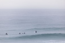 Grommets make the most of clean conditions in the rain at Blackhead, Dunedin, New Zealand.Credit: www.boxoflight.com/Derek Morrison
