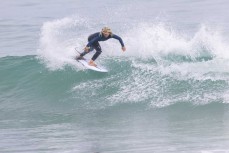 Keo Morrison makes the most of north swell at Whareakeake on the north coast of Dunedin, New Zealand.Credit: www.boxoflight.com/Derek Morrison