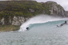 Keo Morrison gets barreled at a remote beachbreak in the Catlins, New Zealand. Photo: Derek Morrison