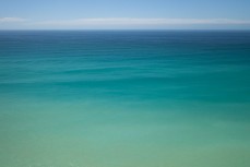 Intense colours of the water at a surf break near Kaikoura, New Zealand. Photo: Derek Morrison