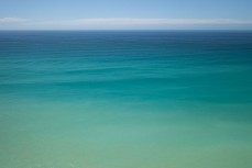 Intense colours of the water at a surf break near Kaikoura, New Zealand. Photo: Derek Morrison