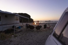 Beach camping and smoky campfires at Fox River, West Coast, New Zealand.