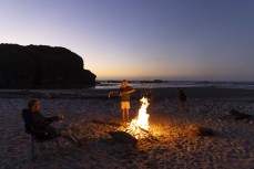 Beach camping and smoky campfires at Fox River, West Coast, New Zealand.