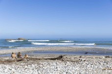 Sunshine and waves post rave at Fox River, West Coast, New Zealand.