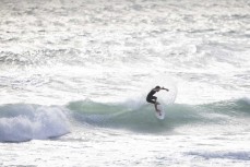 Early start at the Billabong Grom Series surfing contest held at Whangamata, Coromandel, New Zealand.