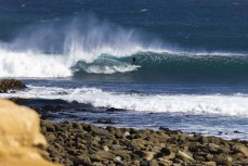 Taylor Hutchison loving the conditions at a remote break in the Catlins, New Zealand. Photo: Derek Morrison