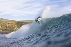 Taylor Hutchison loving the conditions at a remote break in the Catlins, New Zealand. Photo: Derek Morrison