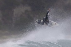 Jack McLeod goes to the air on the North Coast, Dunedin, New Zealand.