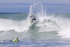 Alexis Owen hits a section during the Kaikoura Grom Comp held  at a surf break near Kaikoura, New Zealand. Photo: Derek Morrison