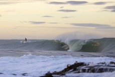 Dale Hunter gets a barrel at a remote beachbreak in the Catlins, New Zealand. Photo: Derek Morrison