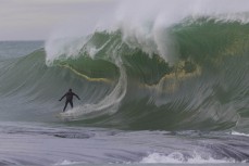 Dale Hunter gets a barrel at a remote beachbreak in the Catlins, New Zealand. Photo: Derek Morrison