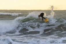 Dusty Ferguson enjoys an afternoon session at Whale Bay, Raglan, Waikato, New Zealand.