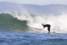Jake Owen tears a wave up on a fun autumn day at Blackhead, Dunedin, New Zealand.
Photo: Derek Morrison