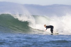 Jake Owen tears a wave up on a fun autumn day at Blackhead, Dunedin, New Zealand.Photo: Derek Morrison
